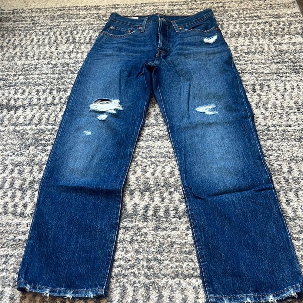 Levi blue jeans with rips